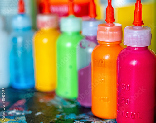 photograph of acrylic paints in the artist's studio