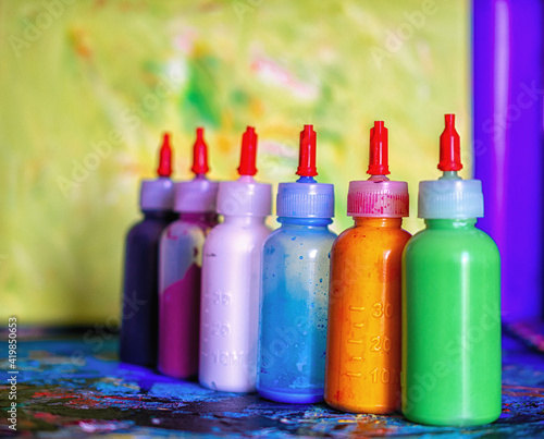 photograph of acrylic paints in the artist's studio