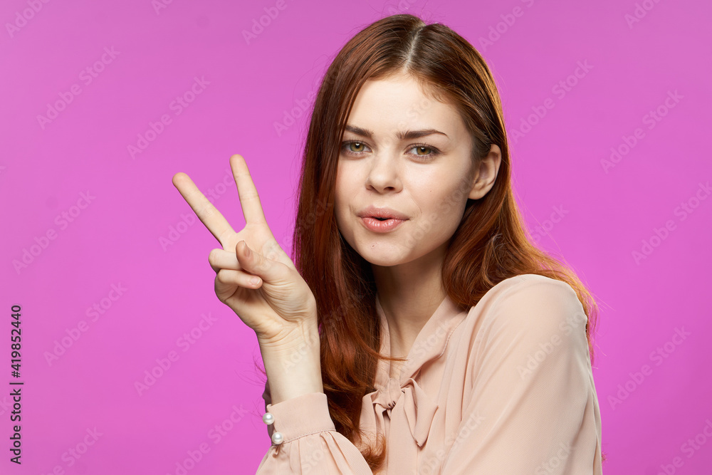 pretty woman gesturing with hands glamor fashion fun pink background close-up pretty woman gesturing with hands glamor fashion fun pink background close-up