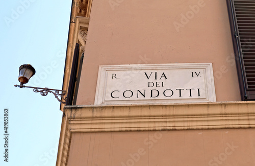 text of via CONDOTTI famous for the shops and the windows in Rom photo