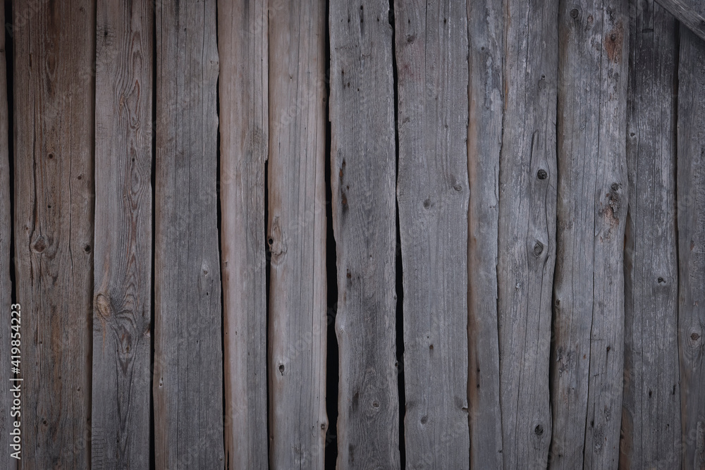 Naklejka premium Background from old boards that have darkened from time to time.