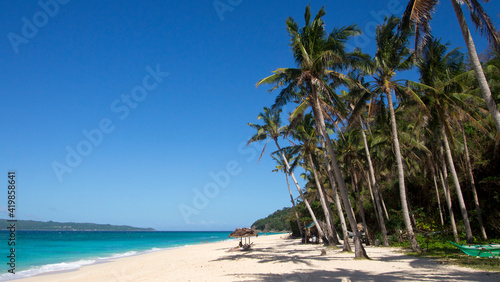 Fototapeta Naklejka Na Ścianę i Meble -  Palms on beautiful Puka Beach on Boracay, Philippines