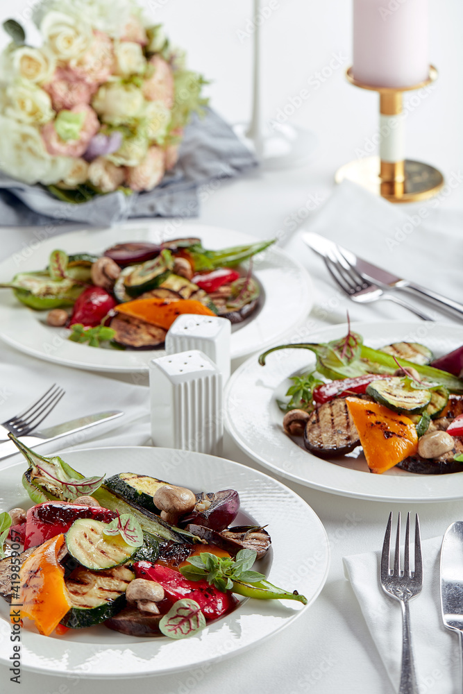 Grilled vegetables on a white plates. restaurant Grilled vegetables on a white plates. restaurant