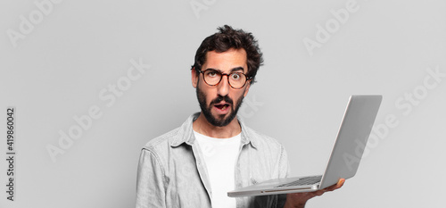 Photography young crazy bearded man afraid or confused expression