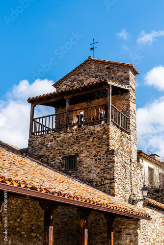 Old stone church in Puebla de la Sierra in the mountain range of Madrid