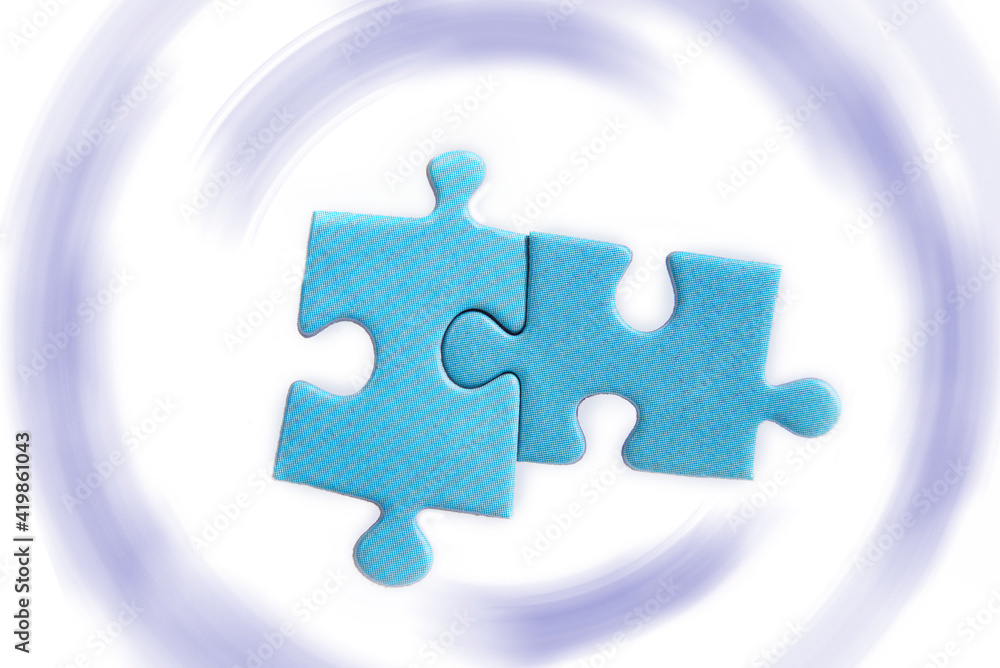 Puzzles on a white background. Solution and teamwork concept Puzzles on a white background. Solution and teamwork concept