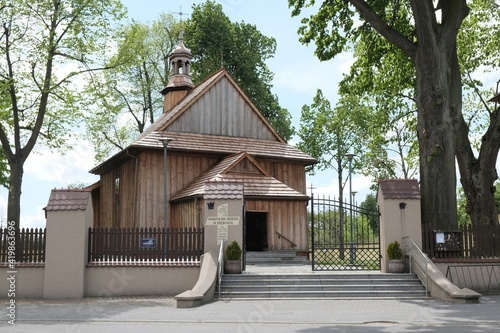 Wooden historic church of Saint Giles in the village of Zrebice in Jura Krakow - Czestochowa, Poland photo