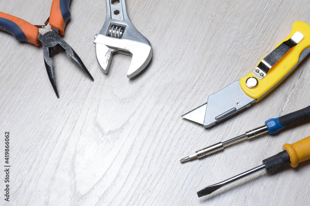 tools for minor home repairs are on the countertop. view from above. tools for minor home repairs are on the countertop. view from above.