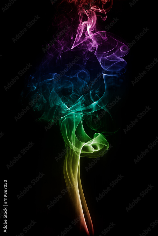 Obraz premium A texture of smoked on isolated background, in rain bow shade.