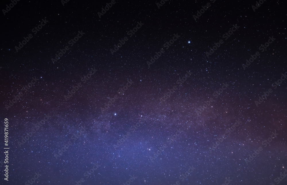 Multicolored stars in the night sky. The Milky Way. Multicolored stars in the night sky. The Milky Way.