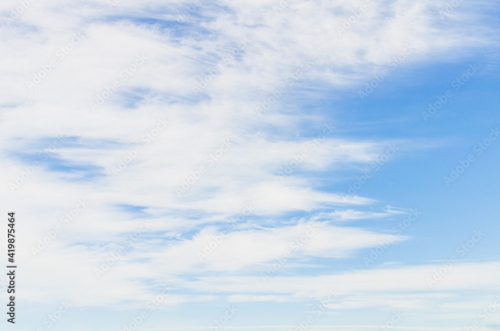 White clouds in a bright blue sky. The beauty of the nature