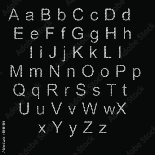 English alphabet. White letters with black specks. 