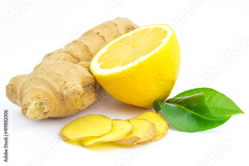 Ginger, lemon and green leaves , bio, healthy food isolated on white background