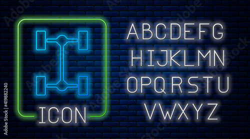 Glowing neon Chassis car icon isolated on brick wall background. Neon light alphabet. Vector
