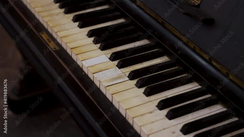 Close up on a old piano keyboard - 4k video Close up on a old piano keyboard - 4k video