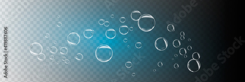 Set of realistic colorful soap bubbles. Transparent realistic soap bubbles isolated on transparent background. © luda
