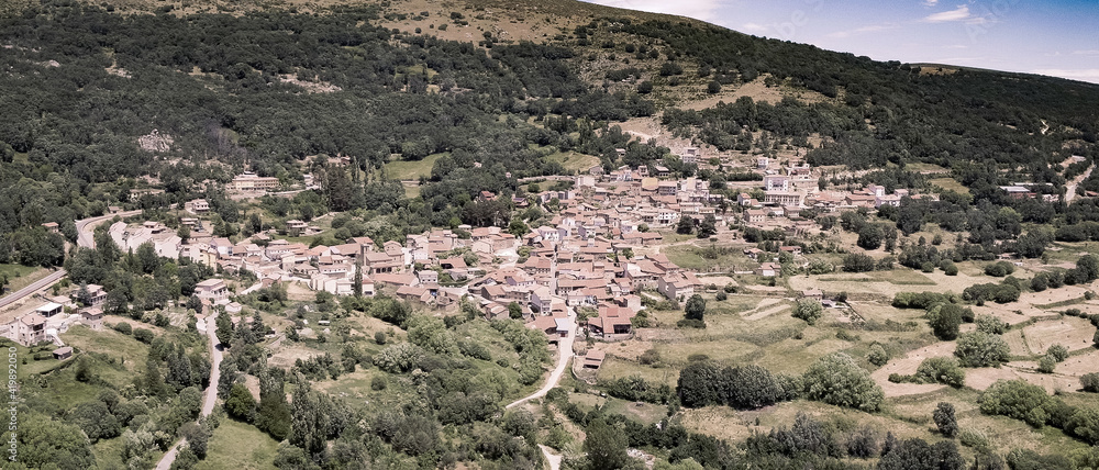 aerial view from drone over mountains in the town of Navacepeda de Tormes in Avila, Spain