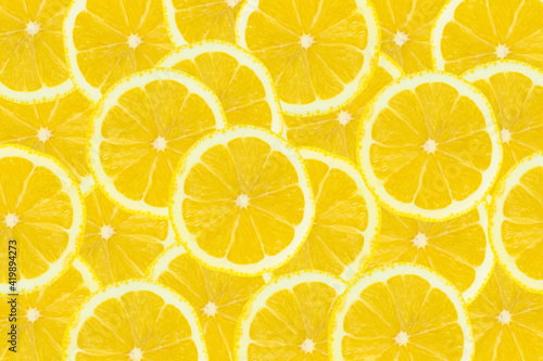 Fresh yellow Lemon slice cuted use for top view background.