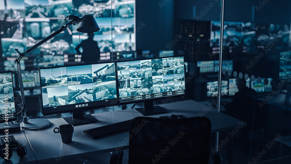 Two Digital Computer Screens with Surveillance CCTV Video in a Harbour