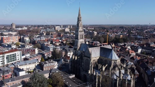 Aerial fly-by Basilica Our Lady Saint Cordon tower, Valenciennes photo