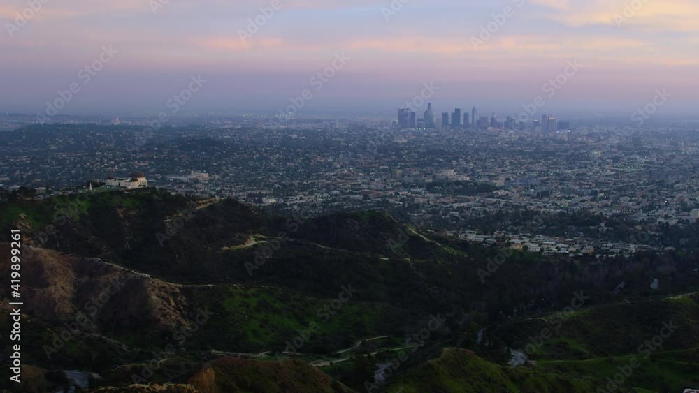Great view of the Griffith Observatory in Mount Hollywood. Los Angeles, California. Downtown skyline with its famous skyscrapers during sunset. Shot on Red Weapon 8K.
Great view of the Griffith Observatory in Mount Hollywood. Los Angeles, California. Downtown skyline with its famous skyscrapers during sunset. Shot on Red Weapon 8K.