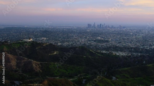 
Great view of the Griffith Observatory in Mount Hollywood. Los Angeles, California. Downtown skyline with its famous skyscrapers during sunset. Shot on Red Weapon 8K.
