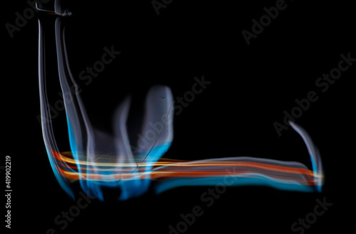 Reflection of moving colored light on a chrome surface