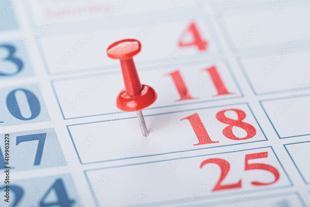Fototapeta premium calendar and marked the date the red pushpin