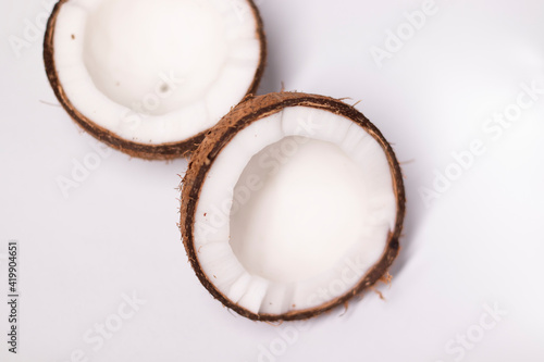 opened coconut isolated on white background. tropical fruit, nut
