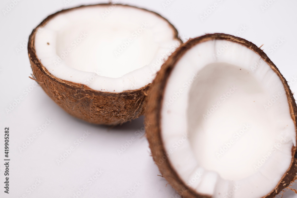 opened coconut isolated on white background. tropical fruit, nut opened coconut isolated on white background. tropical fruit, nut