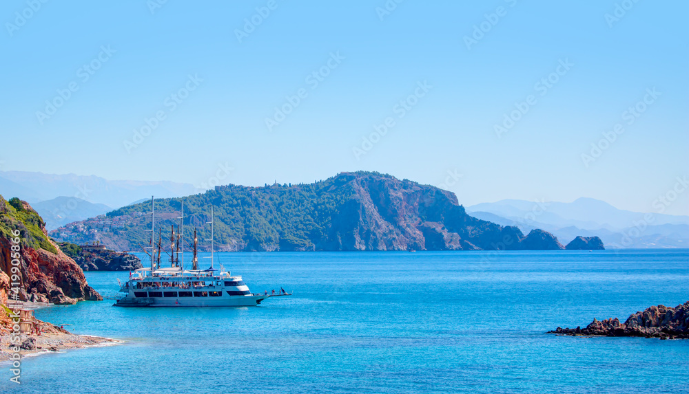 Alanya peninsula with blue mountains view from beach