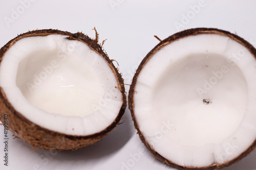 opened coconut isolated on white background. tropical fruit, nut