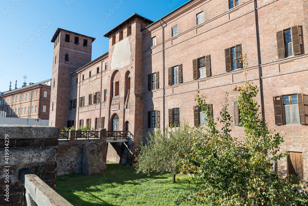Castle with moat and bridge. Vercelli city, Italy. Currently the seat of the Palace of Justice as written above the entrance, it dates back to the 13th century