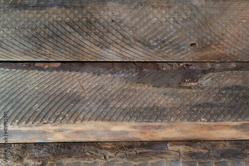 Old wooden background. Boards are eaten by bugs. Retro wood planks. Top view. Copy space.