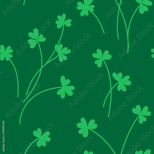 St Patrick's day seamless pattern design template. Green clover leaves on green background. Vector stock illustration.