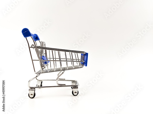 Trolley isolated with white background. Shopping concept.