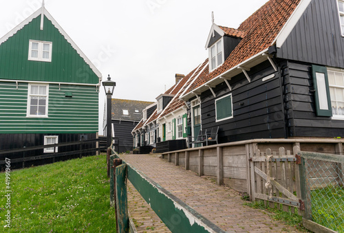 Typical Dutch village with beautiful wooden houses on the island of Marken in the Netherlands, Holland