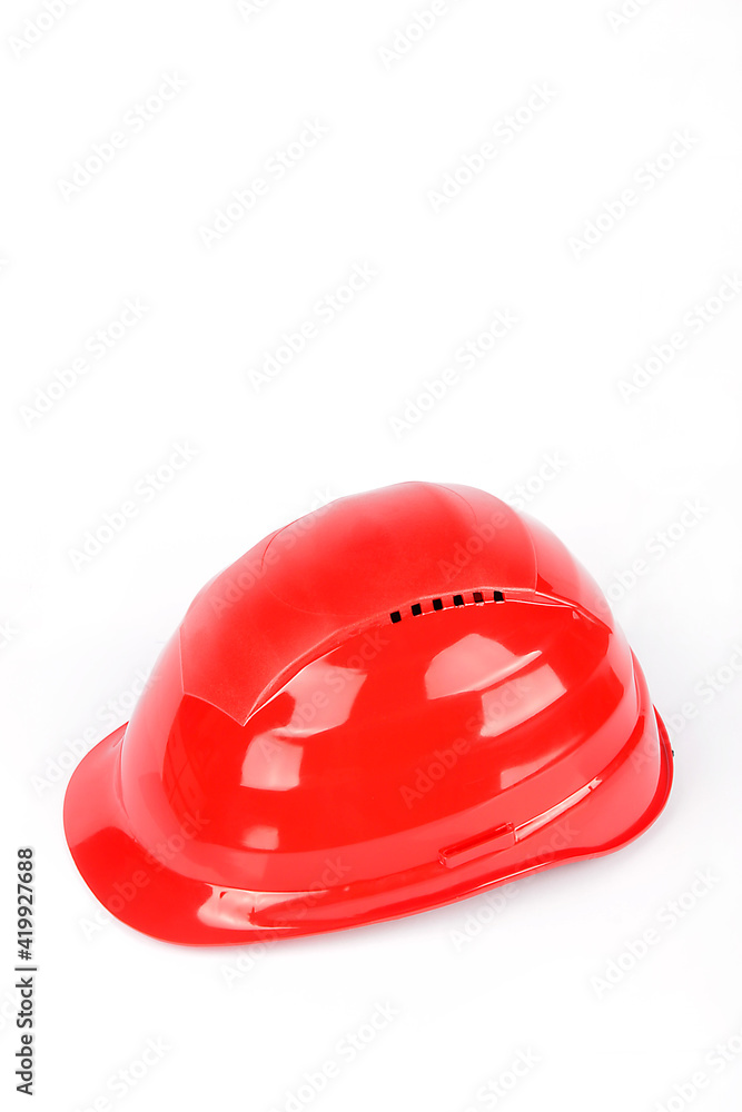 Fototapeta premium Isolated Red Work Helmet On White Background