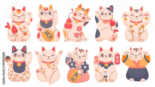 Japanese lucky cats. Cartoon maneki neko toy in traditional clothes, holding fish, bells and gold coin. Asian waving fortune cat vector set photo