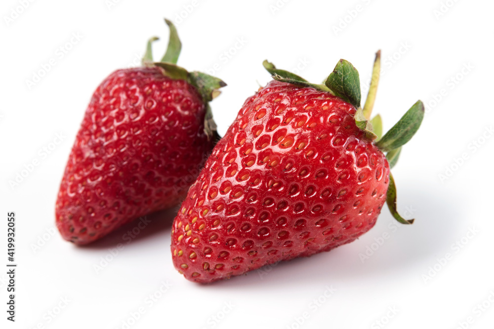 Red strawberries isolated on white background macro view Red strawberries isolated on white background macro view