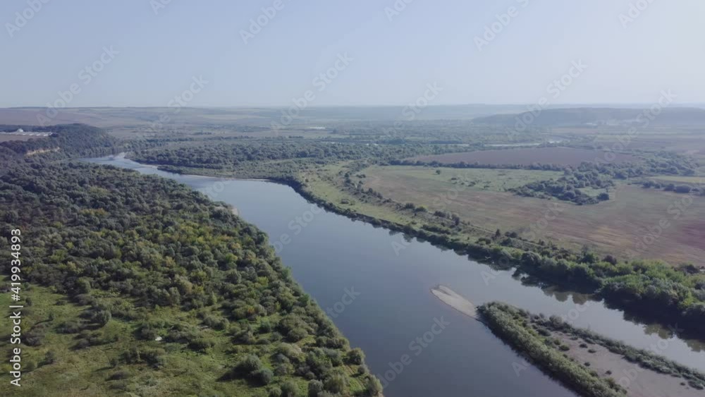 Flight through majestic river Dnister, lush green forest Flight through majestic river Dnister, lush green forest