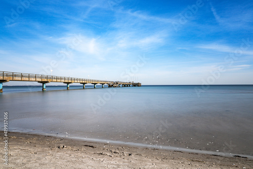 pier on the baltic sea on a sandy beach