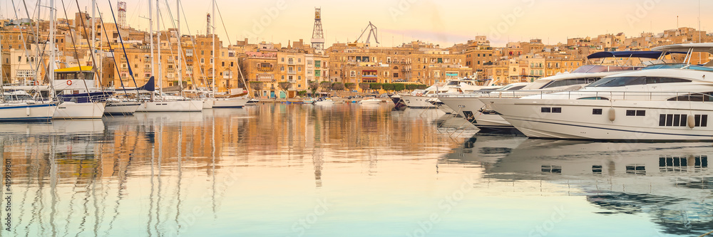 Rows of sailing boats on Senglea marina, Malta