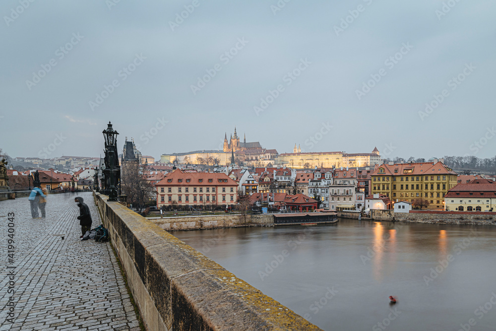 Charlese bridge with Prague castle in the evening in the wintertime, Czech Republic