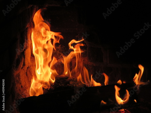 Fire in the antique fireplace 