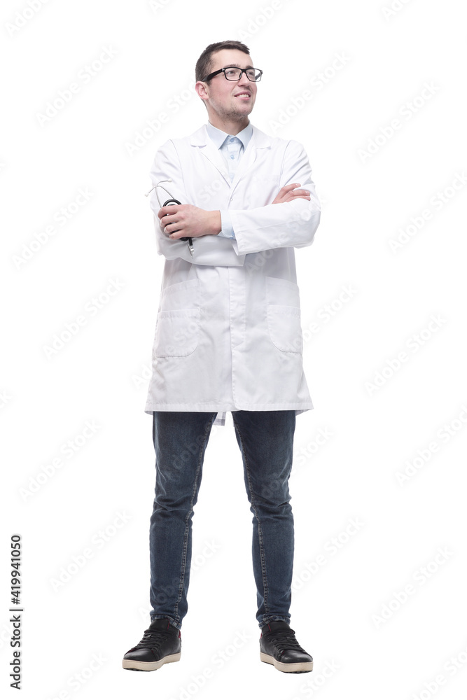 in full growth. a successful male doctor with a stethoscope . in full growth. a successful male doctor with a stethoscope .