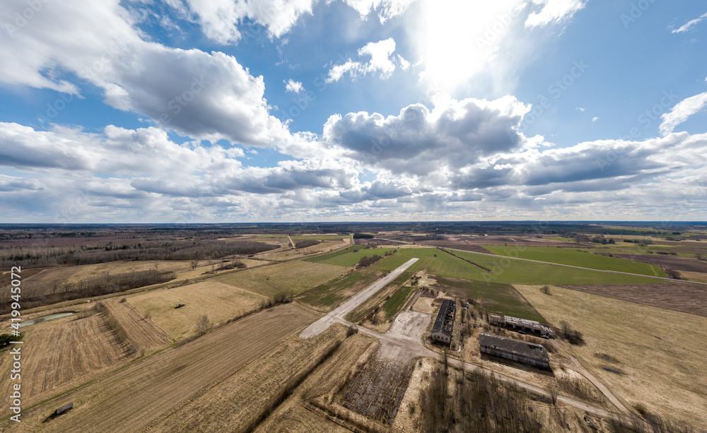 Abandoned airfield in Latvia. View from the drone on a summer day