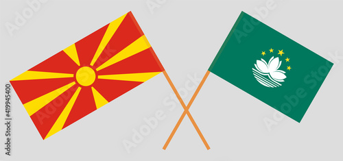 Crossed flags of North Macedonia and Macau. Official colors. Correct proportion