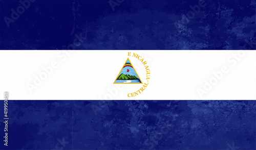 Grunge Nicaragua flag. Nicaragua flag with waving grunge texture. Vector background.