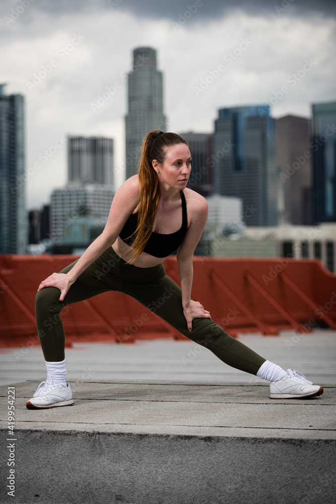 Young Athlete Warms Up on Los Angeles Rooftop Young Athlete Warms Up on Los Angeles Rooftop